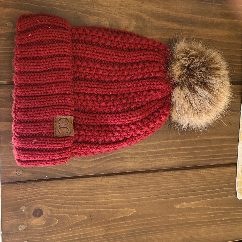 CC burgundy beanie with fuzzy ball